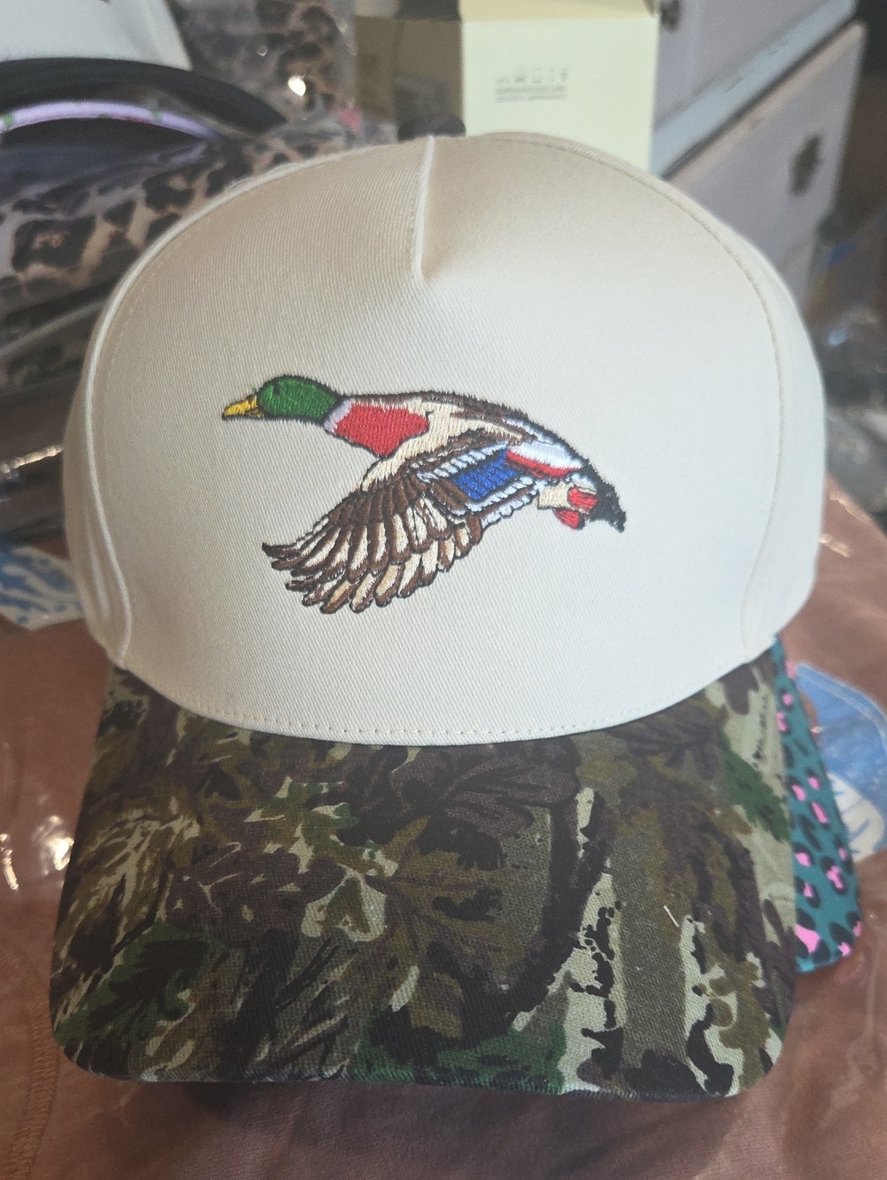 Embroidered Flying Duck Trucker Hat - Cream Crown, Camouflage Bill